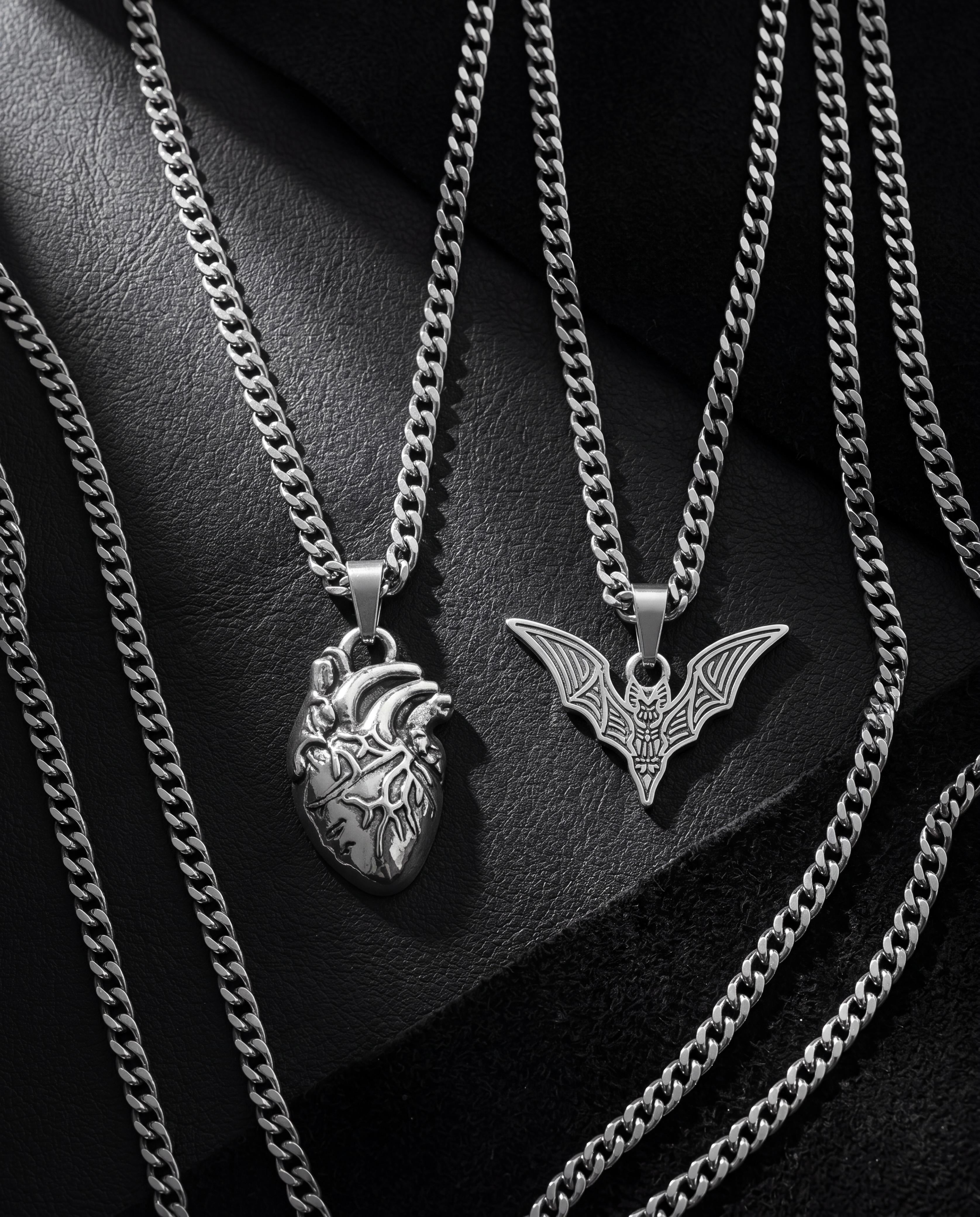 Heart and bat necklace